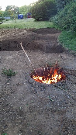exactly 20' straight out my back door is where the fire pit was put and 10' to its left the pond