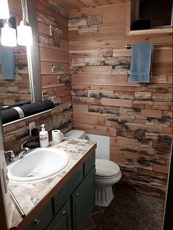 Tile counter top, cedar and stone wall