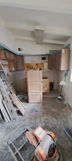 Walls back and cabinets going in