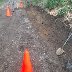 This job was the removal of a railroad tie wall. replacing it with block