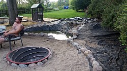 I go pee gravel or slightly larger. A friend Timmy who's a combine mechanic brought my fire pit all the way from Colorado for me. Its in my hairy buddy George there on the lefts yard now days