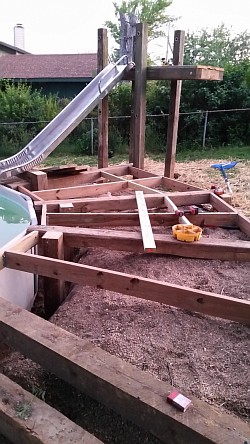 Then came the pool deck. 6x6 uprights every 4' around the pool and every 8' on the outskirts 8' out. Slide deck also built to park a truck on made of 6x6